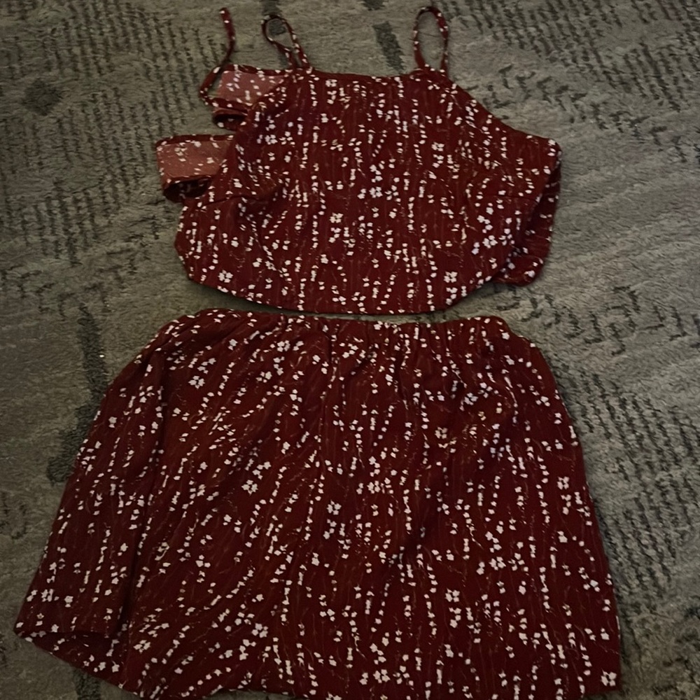 A 2 peice top is a crop top that ties and has matching high waisted shorts